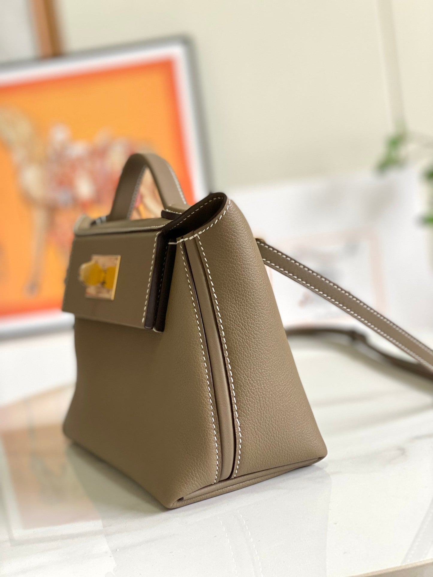 Bolso mini HM 24/24 de 21 cm, piel Etoupe Evercolor, herrajes dorados