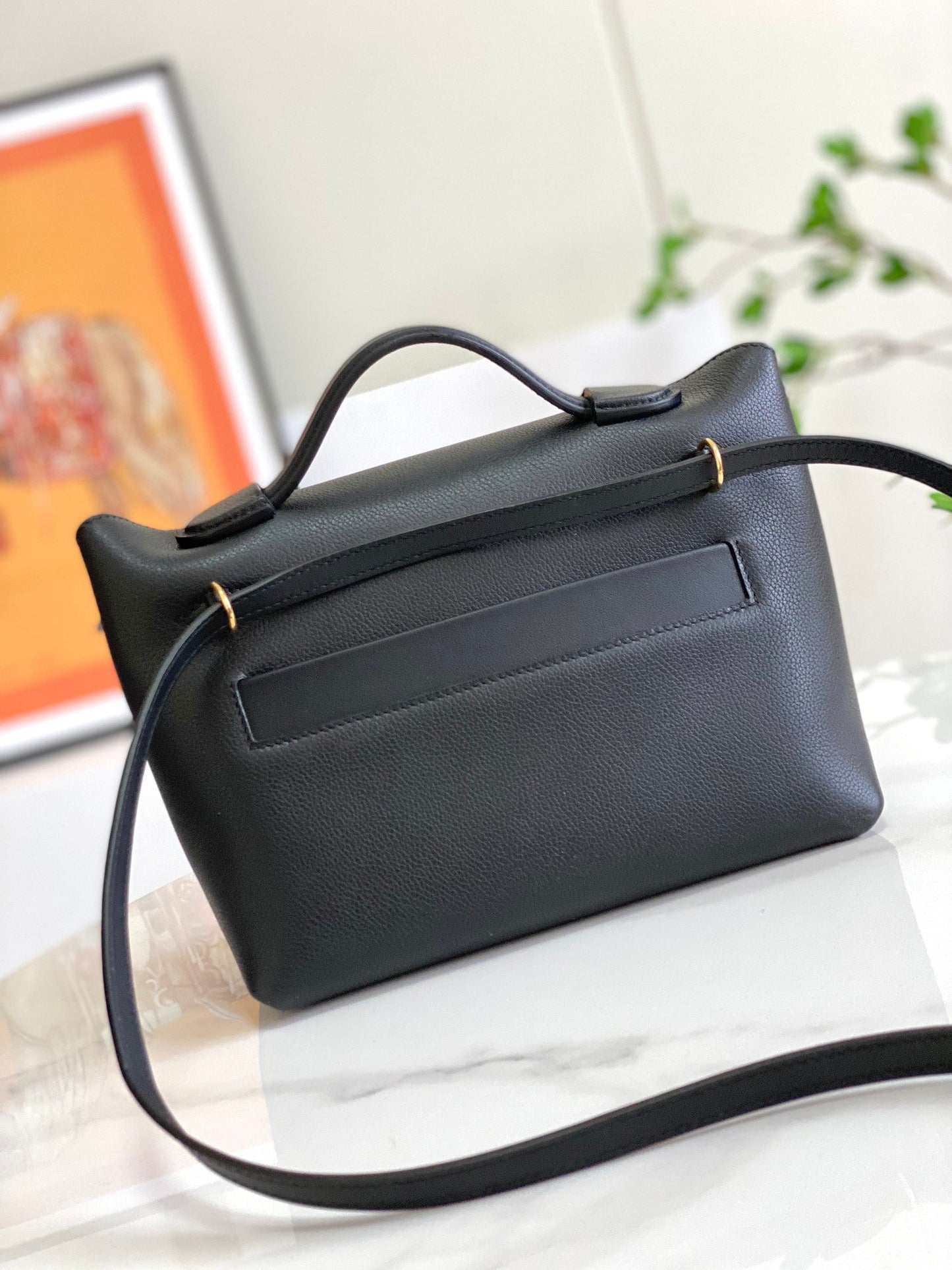 Bolso mini HM 24/24 de 21 cm, piel Evercolor negra, herrajes dorados