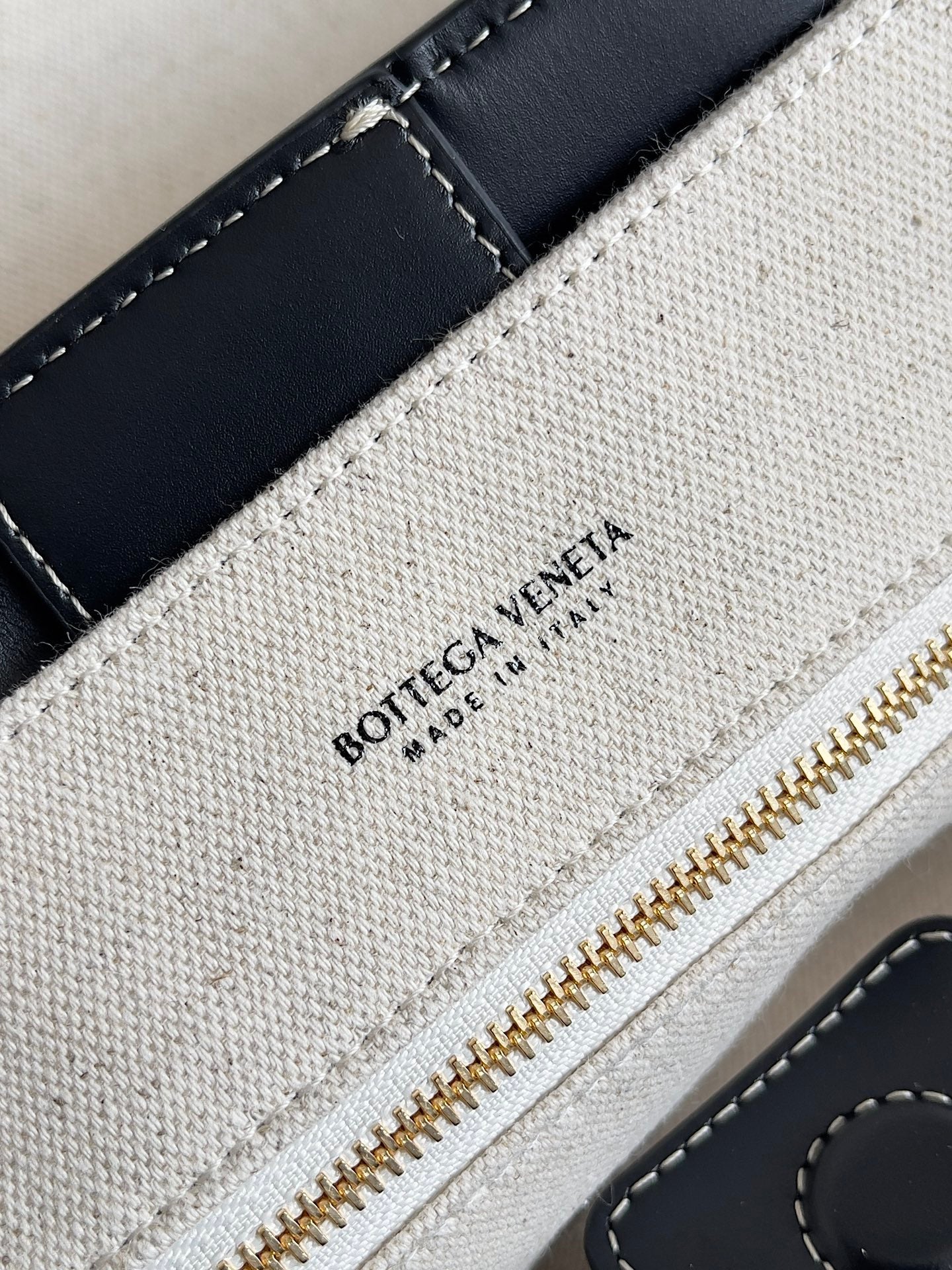 BV Large Andiamo 45 In Beige Canvas Black Calfskin 209025