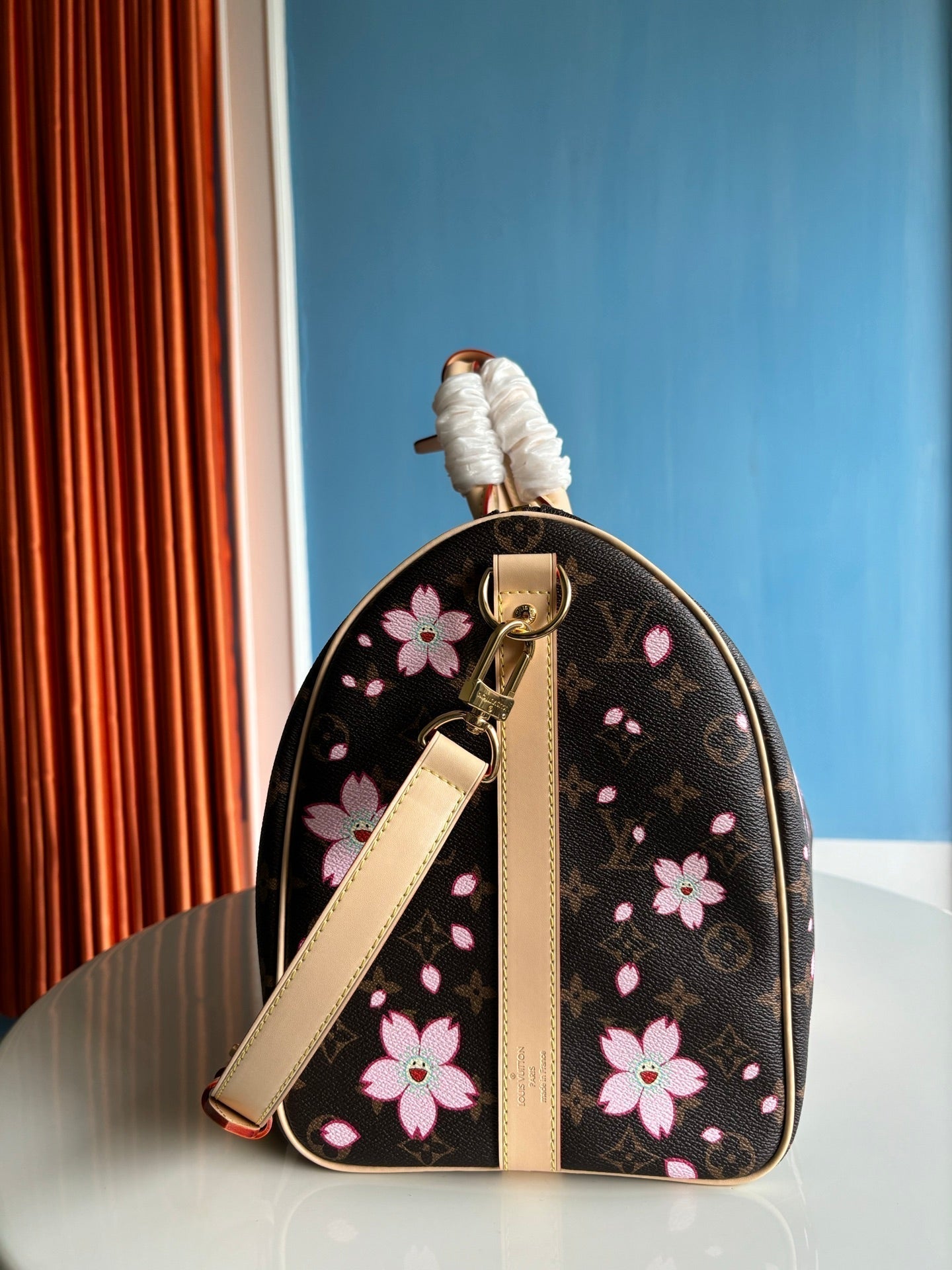 Bolso bandolera LV x TM Keepall de 45 cm con monograma Sakura Brown