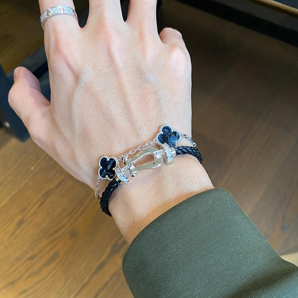 PULSERA DE PLATA DE PIETERSITA CON 5 MOTIVOS DE TRÉBOL DE DIANA