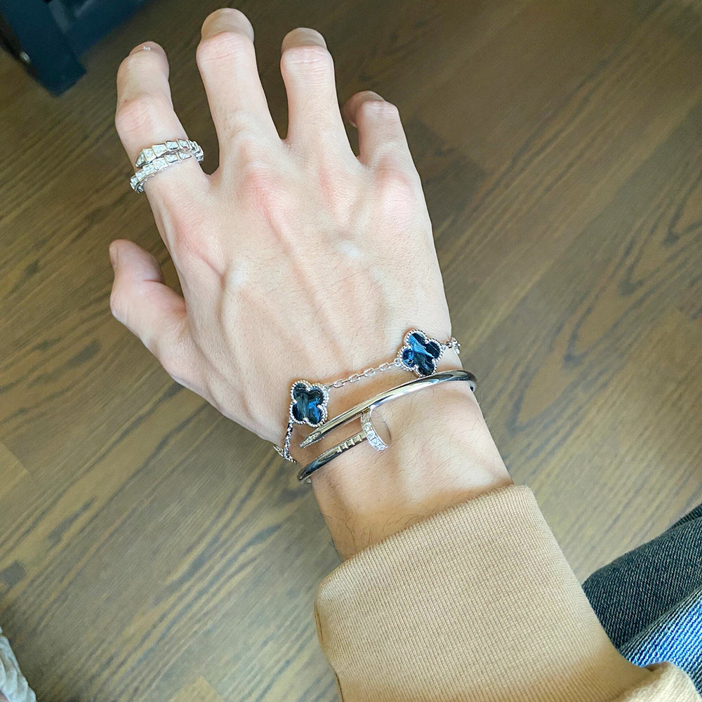PULSERA DE PLATA DE PIETERSITA CON 5 MOTIVOS DE TRÉBOL DE DIANA