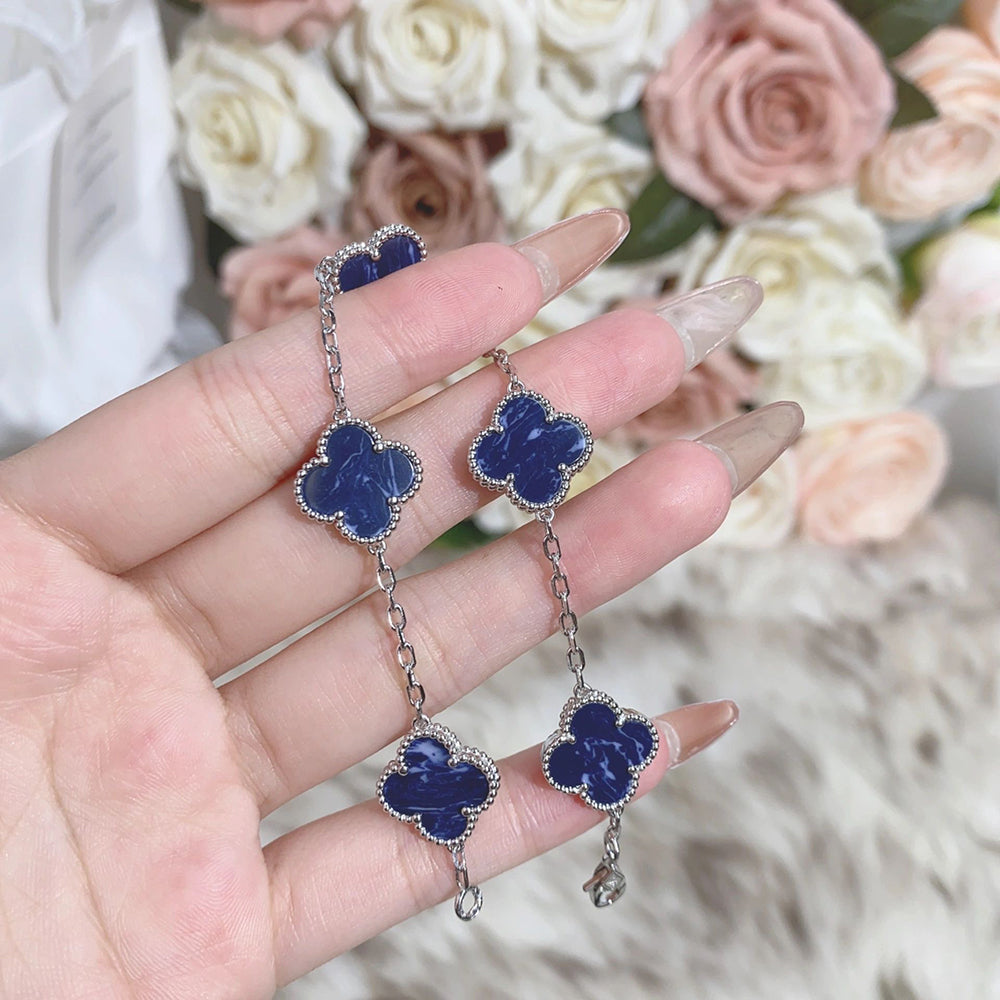 PULSERA DE PLATA DE PIETERSITA CON 5 MOTIVOS DE TRÉBOL DE DIANA