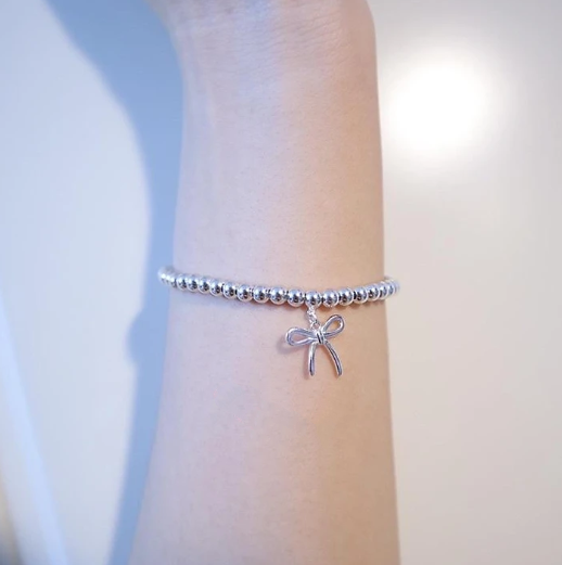 Bracelet en argent sterling avec perles en forme de nœud