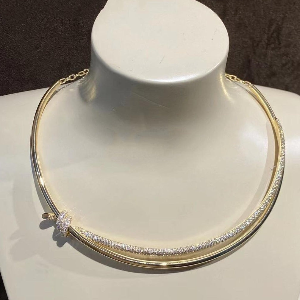 COLLAR DE DOBLE HILERA CON NUDO EN ORO AMARILLO CON DIAMANTES
