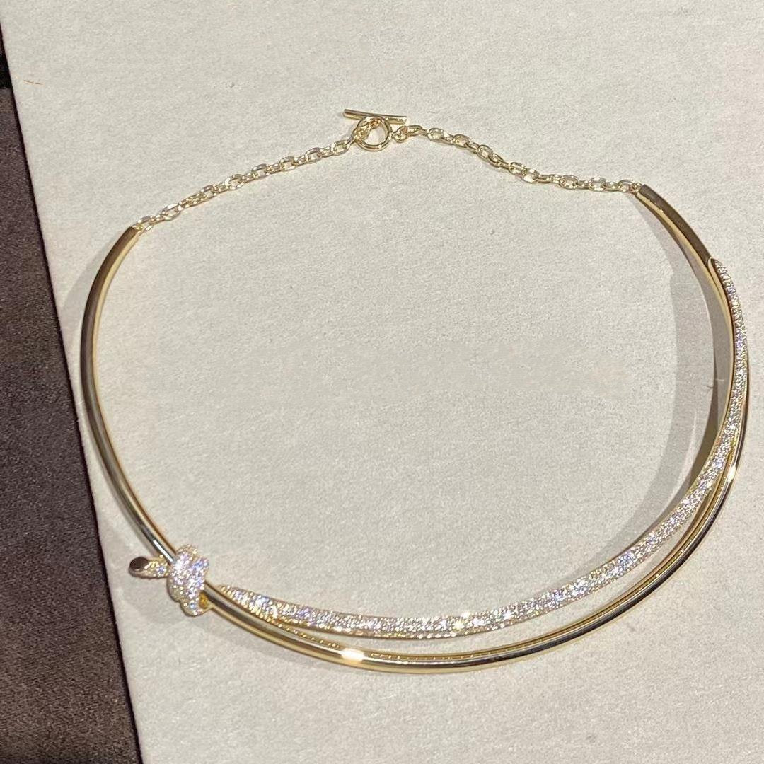 COLLAR DE DOBLE HILERA CON NUDO EN ORO AMARILLO CON DIAMANTES