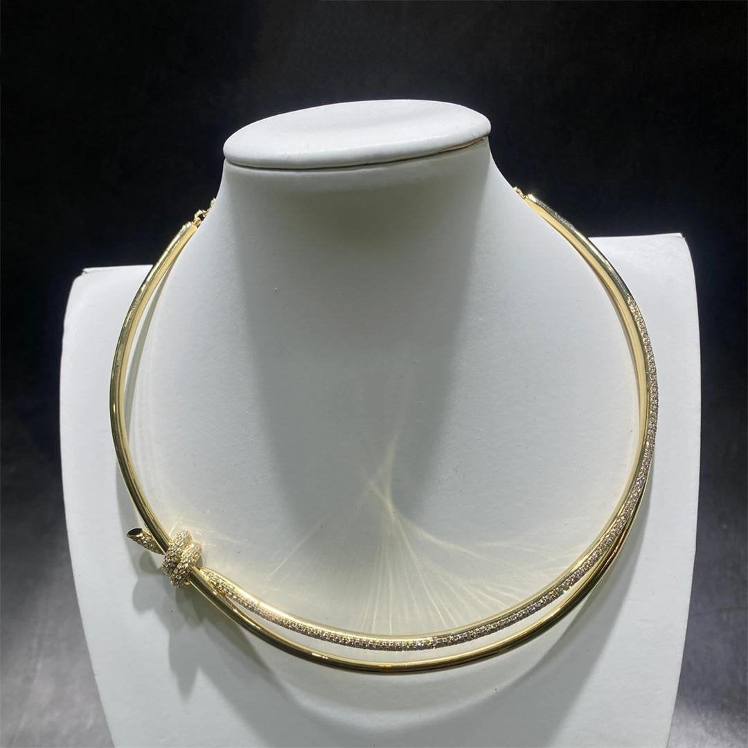 COLLAR DE DOBLE HILERA CON NUDO EN ORO AMARILLO CON DIAMANTES
