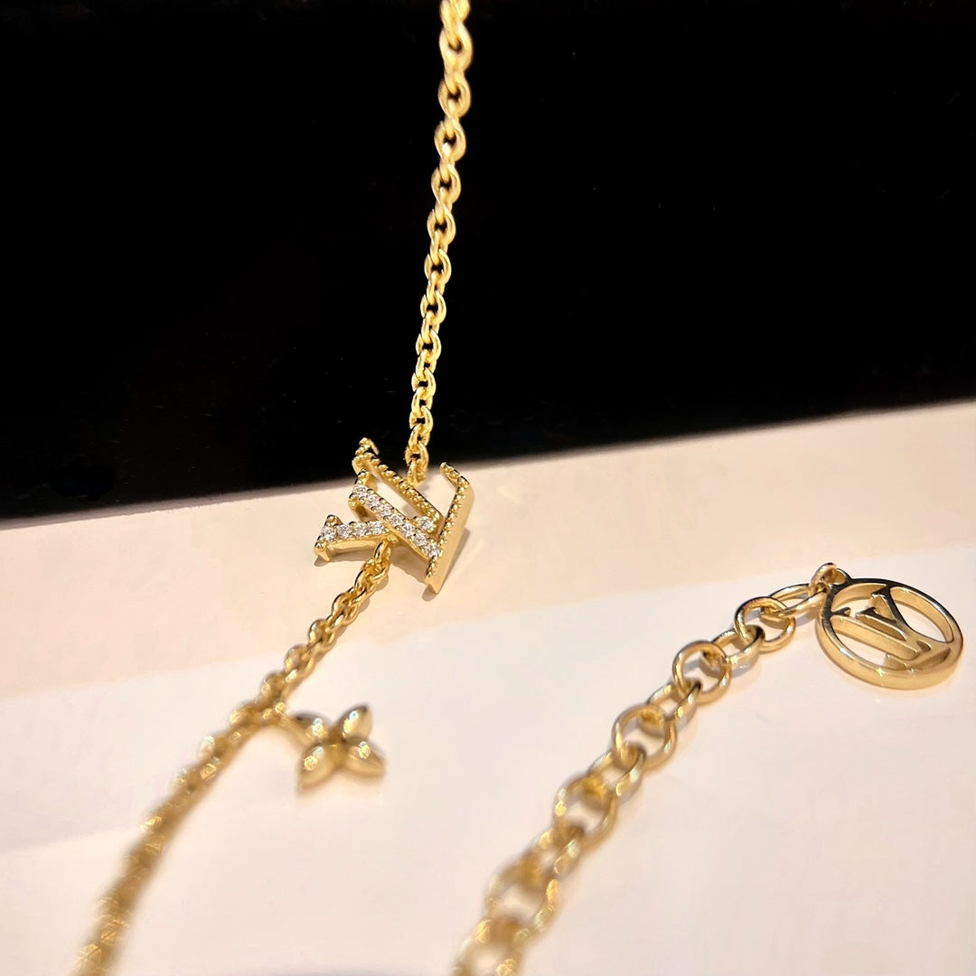 DIANA LOGO STAR MOTIF GOLD BRACELET