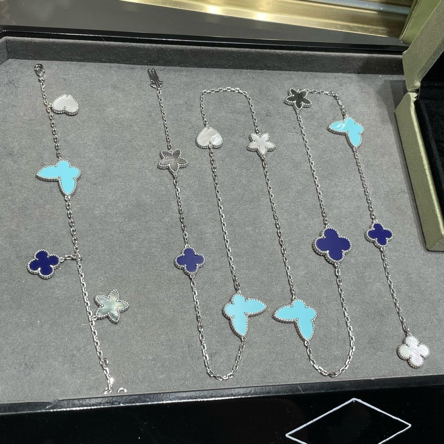 DIANA LUCKY CLOVER SILVER 11 MOTIF NECKLACE