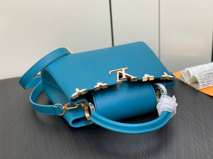 CAPUCINES BB 27 AZUL TAURILLON HARDWARE DORADO