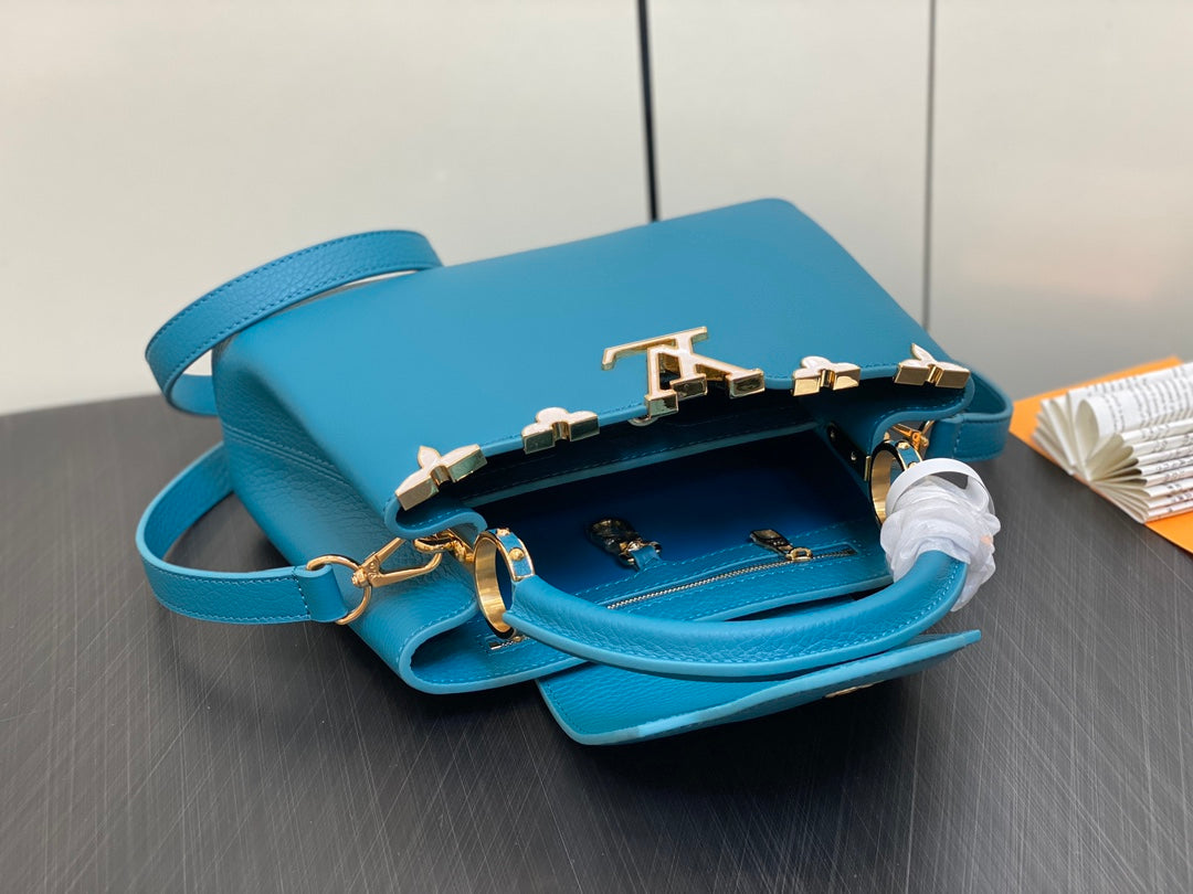CAPUCINES BB 27 AZUL TAURILLON HARDWARE DORADO