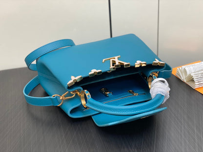CAPUCINES BB 27 AZUL TAURILLON HARDWARE DORADO