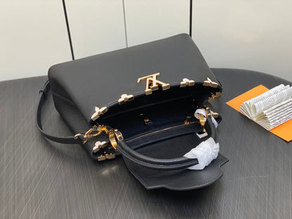 CAPUCINES MM 31 NOIR TAURILLON QUINCAILLERIE OR