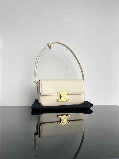 CLASSIC TRIOMPHE 20 PIEL DE BECERRO CREMA CON HERRAJES DORADOS