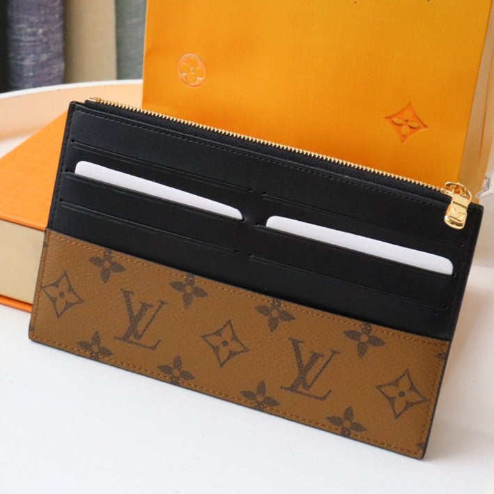 MONEDERO LV SLIM LONA MONOGRAMA REVERSIDA 20 CM