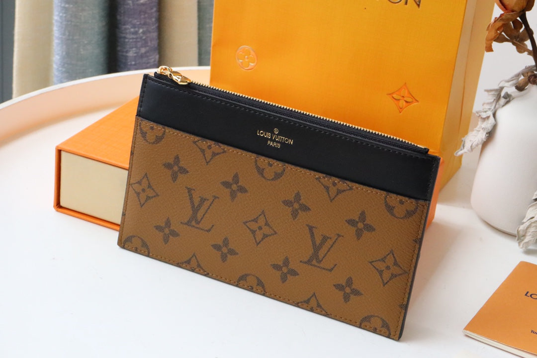 MONEDERO LV SLIM LONA MONOGRAMA REVERSIDA 20 CM