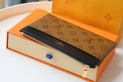 MONEDERO LV SLIM LONA MONOGRAMA REVERSIDA 20 CM