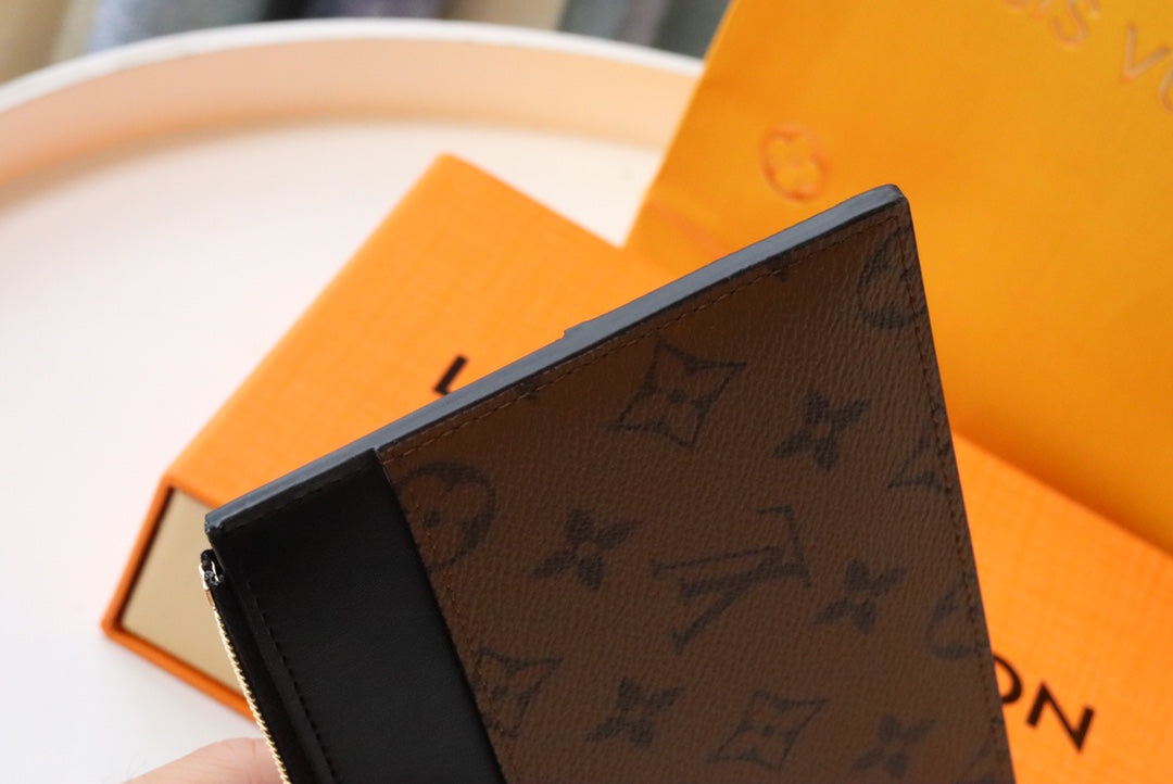 MONEDERO LV SLIM LONA MONOGRAMA REVERSIDA 20 CM