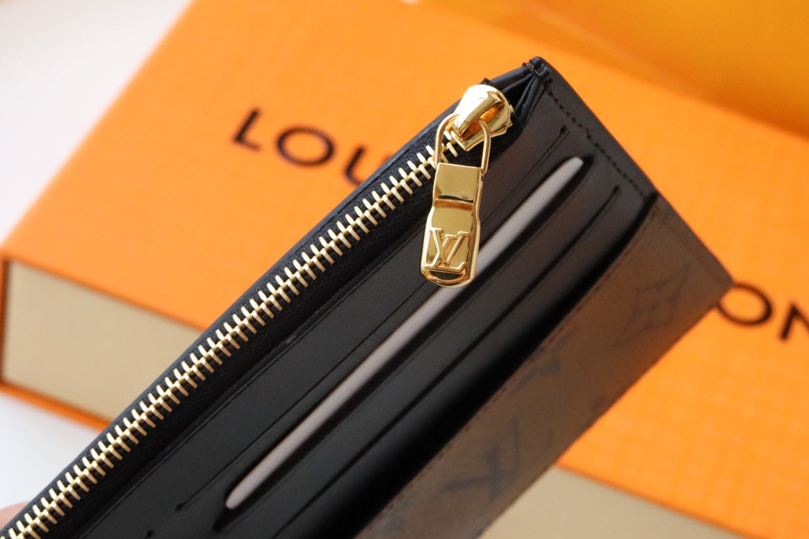 MONEDERO LV SLIM LONA MONOGRAMA REVERSIDA 20 CM