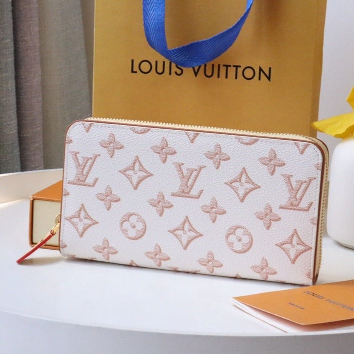 CARTERA CLEMENCE 19.5 LONA MONOGRAMA BLANCO ROSA