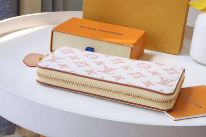 CARTERA CLEMENCE 19.5 LONA MONOGRAMA BLANCO ROSA