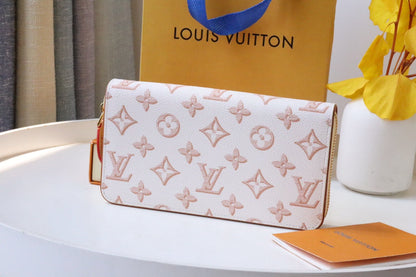CARTERA CLEMENCE 19.5 LONA MONOGRAMA BLANCO ROSA