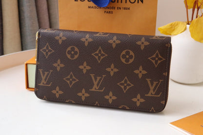 CARTERA VIVIENNE ZIPPY 9.5 LONA CON MONOGRAMA