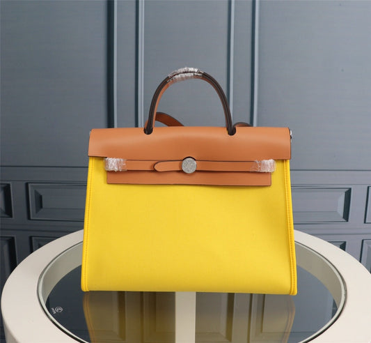 HM HERBAG ZIP 31 LONA LIMÓN Y BRONCE