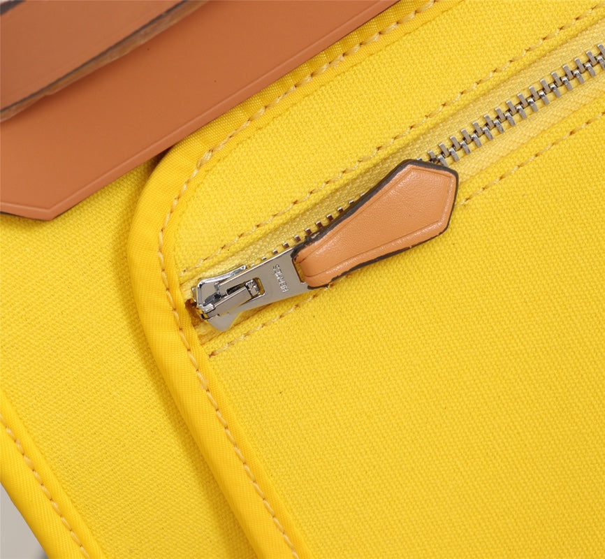 HM HERBAG ZIP 31 LONA LIMÓN Y BRONCE