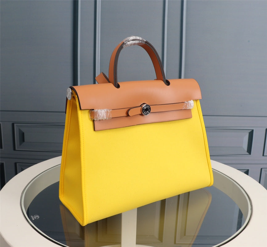 HM HERBAG ZIP 31 LONA LIMÓN Y BRONCE