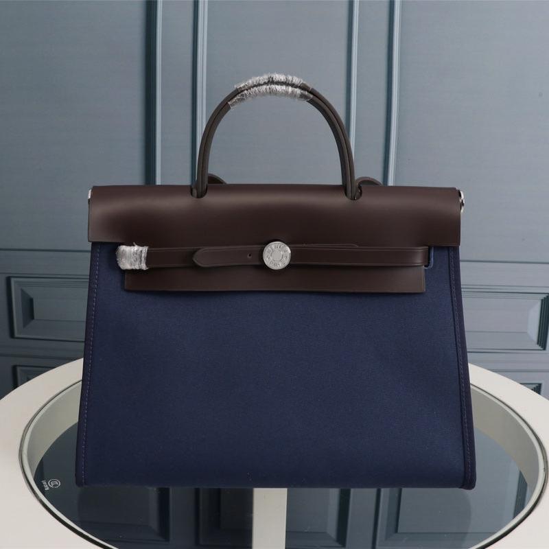 HM HERBAG ZIP 31 LONA AZUL MARINO Y CHOCOLATE