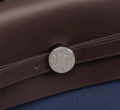 HM HERBAG ZIP 31 LONA AZUL MARINO Y CHOCOLATE