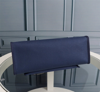 HM HERBAG ZIP 31 LONA AZUL MARINO Y CHOCOLATE
