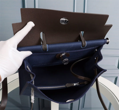 HM HERBAG ZIP 31 LONA AZUL MARINO Y CHOCOLATE