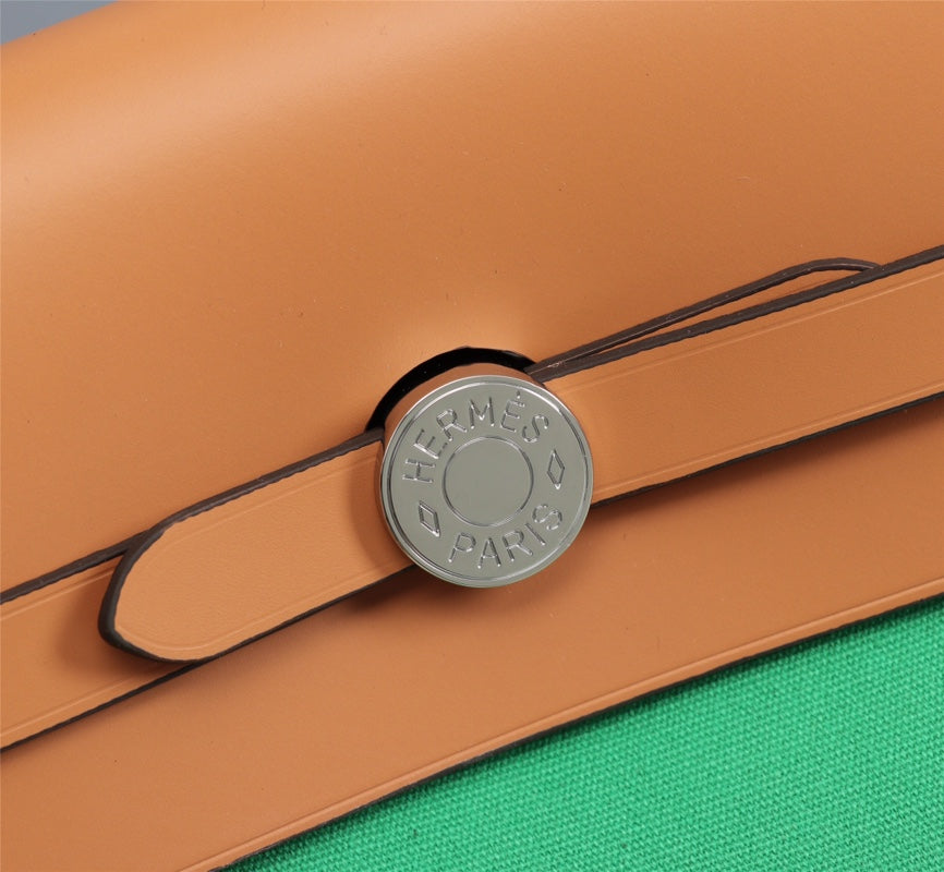HM HERBAG ZIP 31 LONA VERDE BAMBÚ Y BRONCE