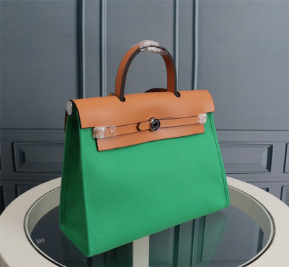 HM HERBAG ZIP 31 LONA VERDE BAMBÚ Y BRONCE