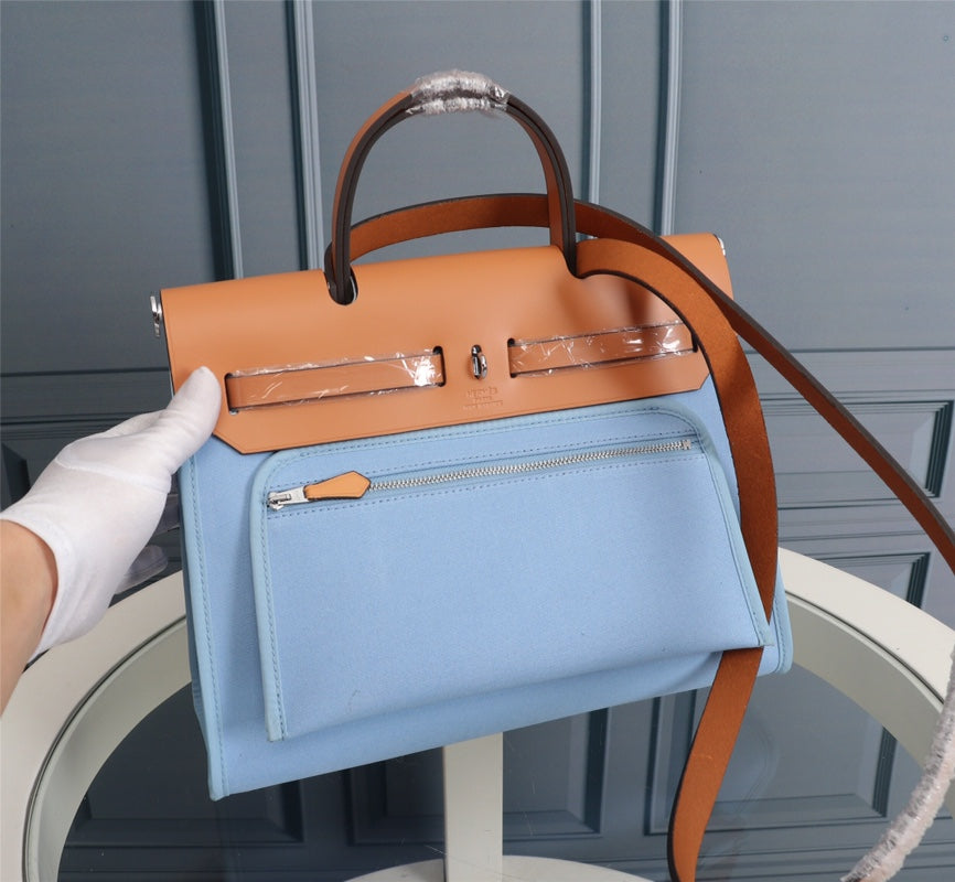 HM HERBAG ZIP 31 LONA CIELO Y BRONCE