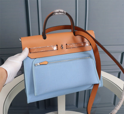 HM HERBAG ZIP 31 LONA CIELO Y BRONCE