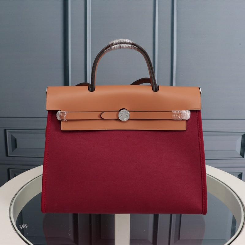 HM HERBAG ZIP 31 LONA ROJO VINO Y COBRE