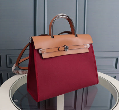 HM HERBAG ZIP 31 LONA ROJO VINO Y COBRE