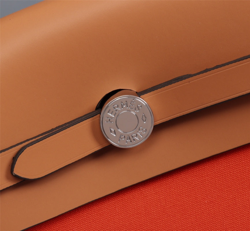 HM HERBAG ZIP 31 LONA ROJA NARANJA Y COBRE