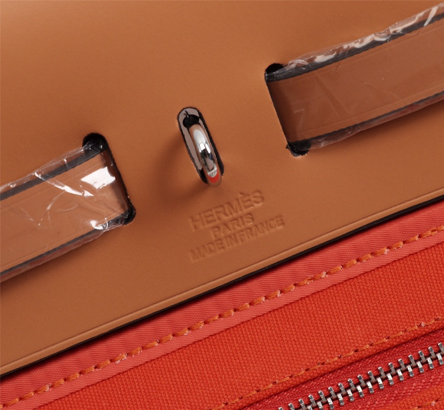 HM HERBAG ZIP 31 LONA ROJA NARANJA Y COBRE