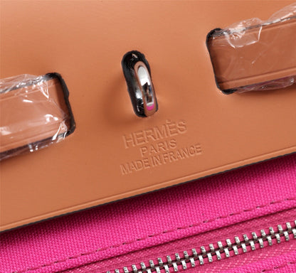 HM HERBAG ZIP 31 LONA ROSA BRILLANTE Y COBRE