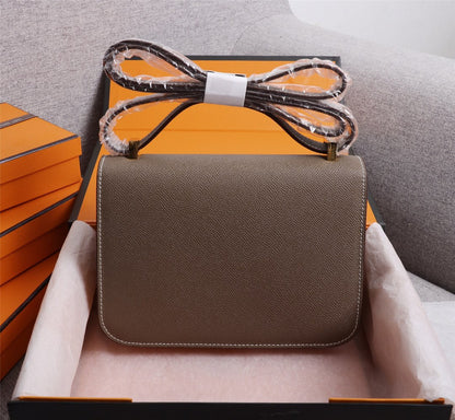 BOLSAS HM CONSTANCE 22 HERRAMIENTAS EPSOM DORADAS CHOCOLATE