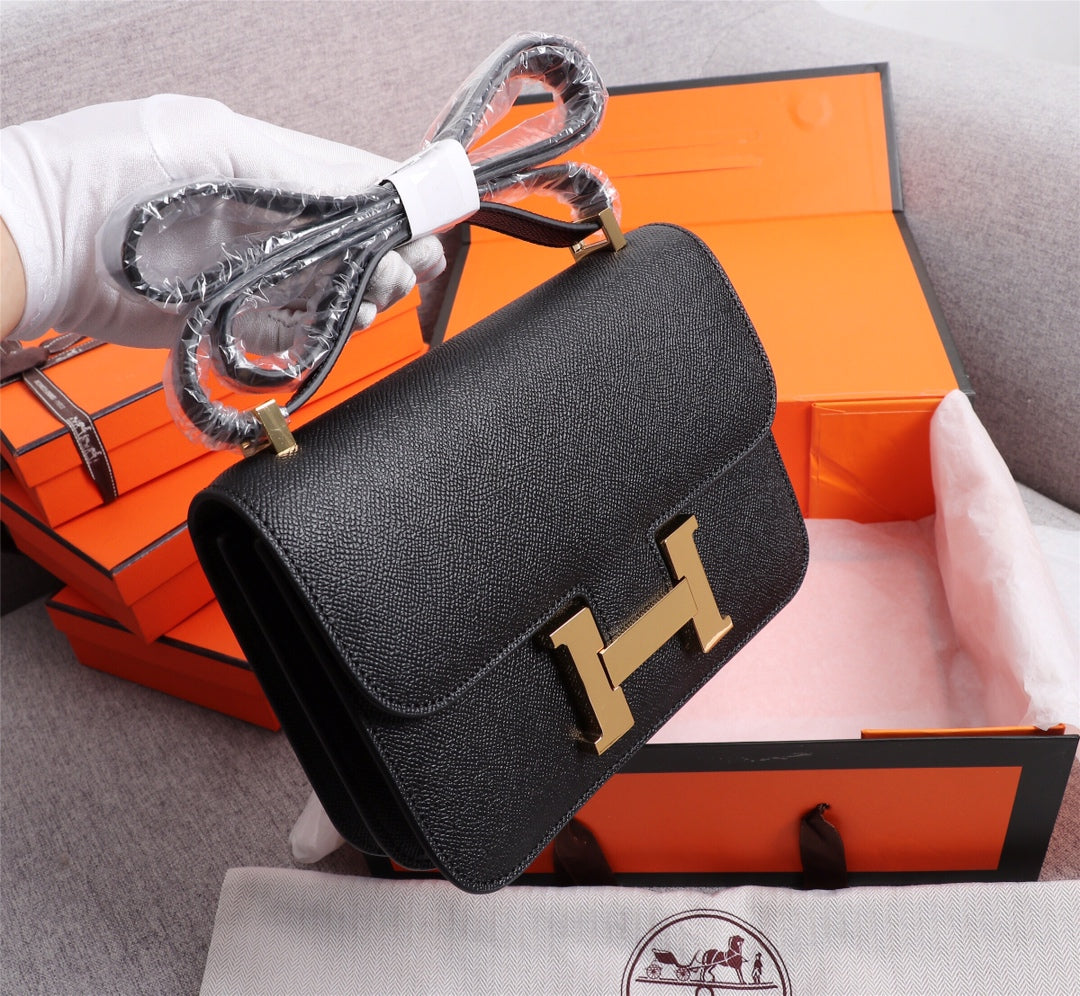 BOLSAS HM CONSTANCE 22 NEGRO EPSOM HARDWARE DORADO