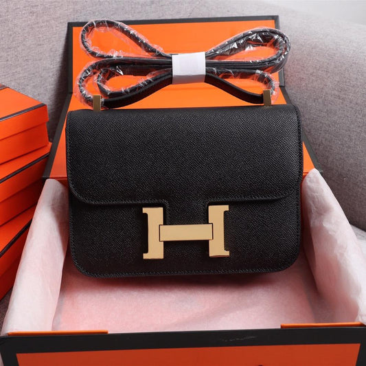 BOLSAS HM CONSTANCE 22 NEGRO EPSOM HARDWARE DORADO
