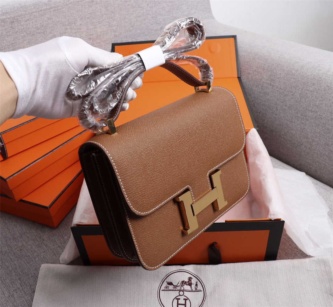 BOLSAS HM CONSTANCE 22 HERRAMIENTAS EPSOM DORADAS ROJAS