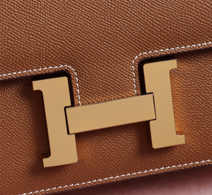 BOLSAS HM CONSTANCE 22 HERRAMIENTAS EPSOM DORADAS ROJAS