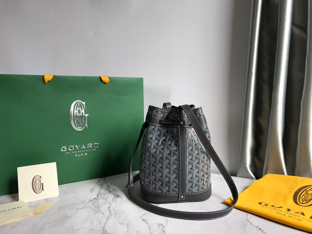BOLSO CUBO PETIT FLOT 22 EN LONA GOYARDINE GRIS Y RIBETE DE PIEL DE CORDERO