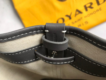 BOLSO CUBO PETIT FLOT 22 EN LONA GOYARDINE GRIS Y RIBETE DE PIEL DE CORDERO